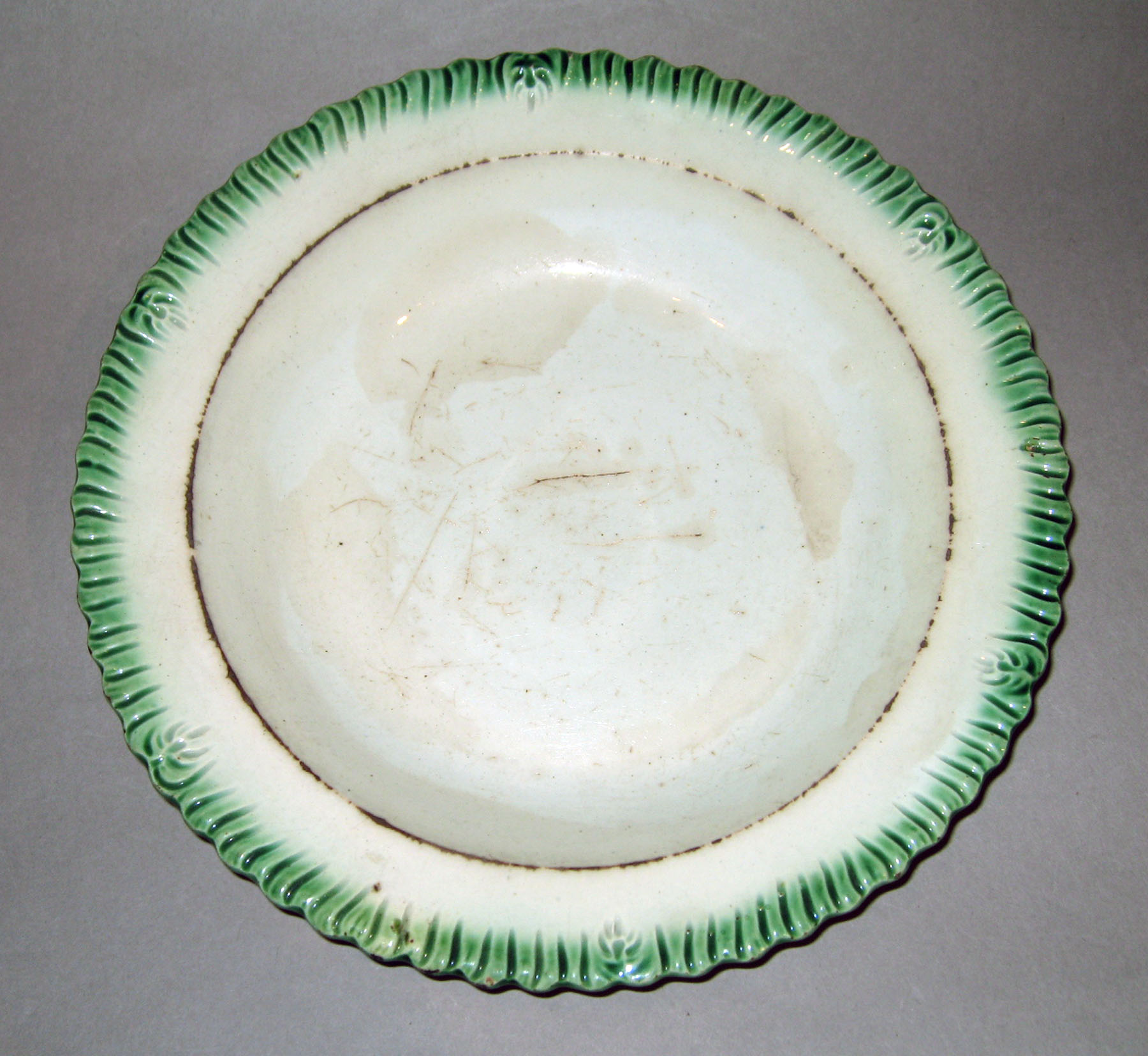 1969.0337.004 Davenport pearlware soup plate