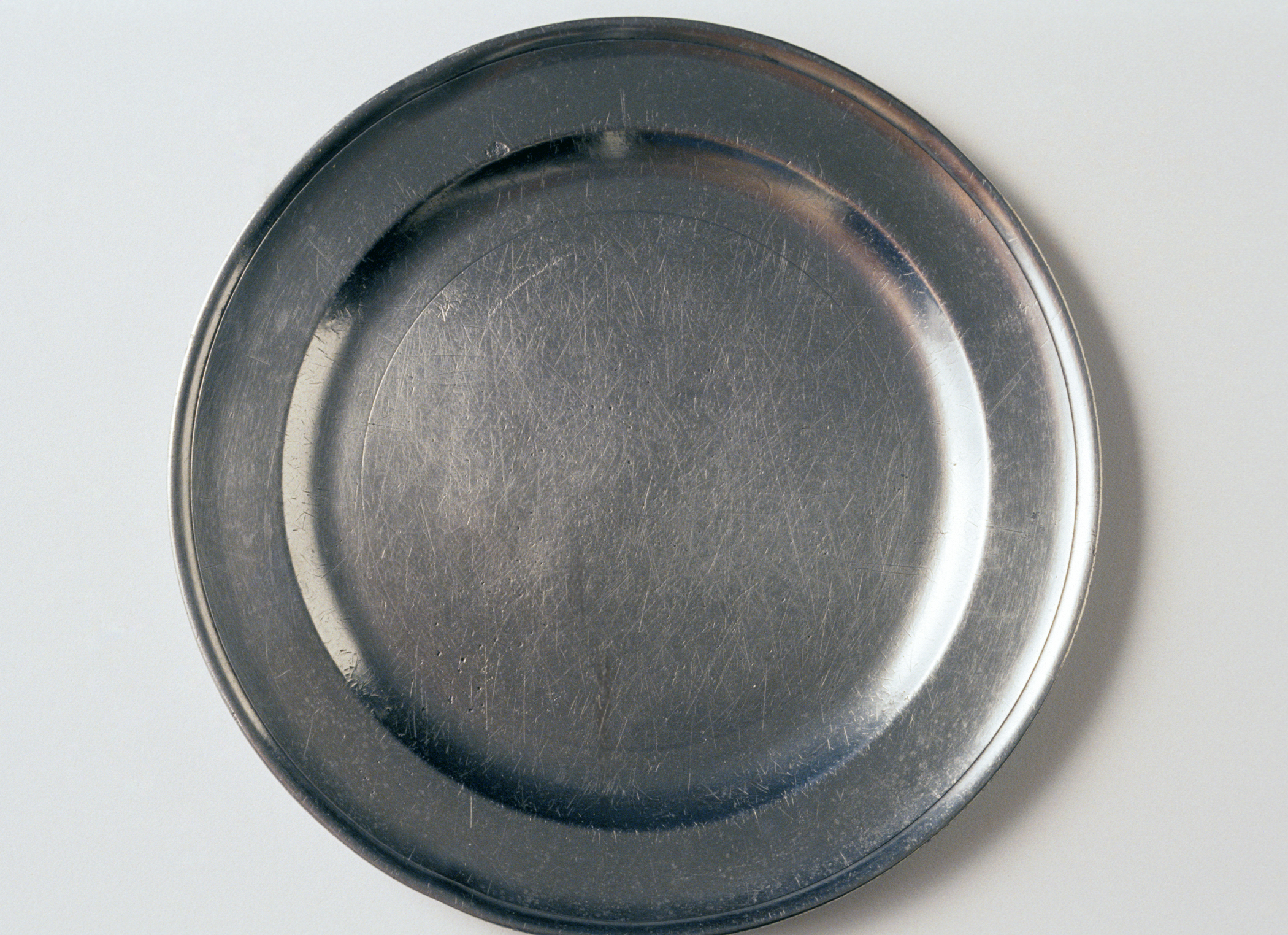 1956.0059.012 Pewter plate
