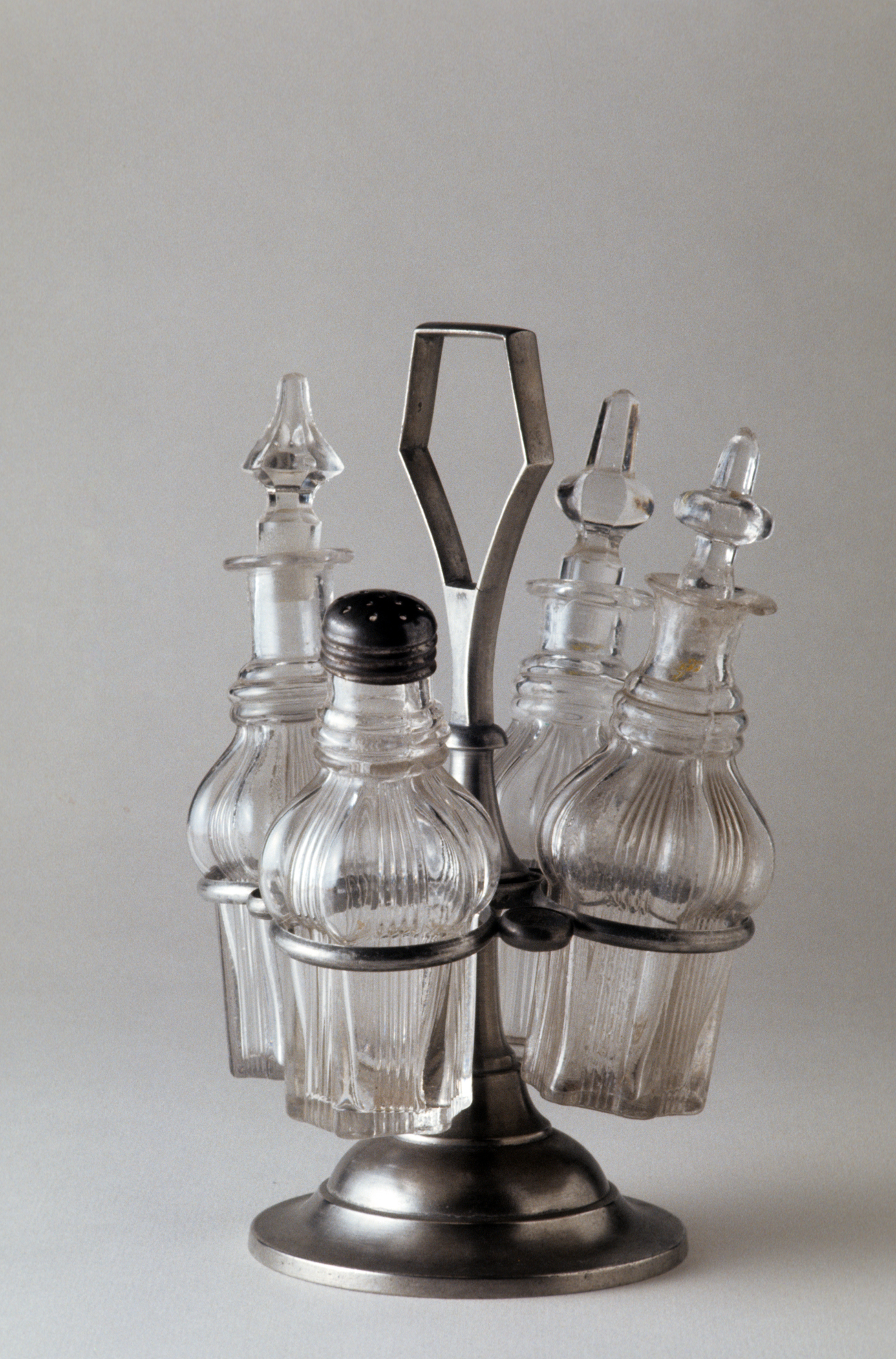 1971.0035 Britannia cruet stand (with bottles)