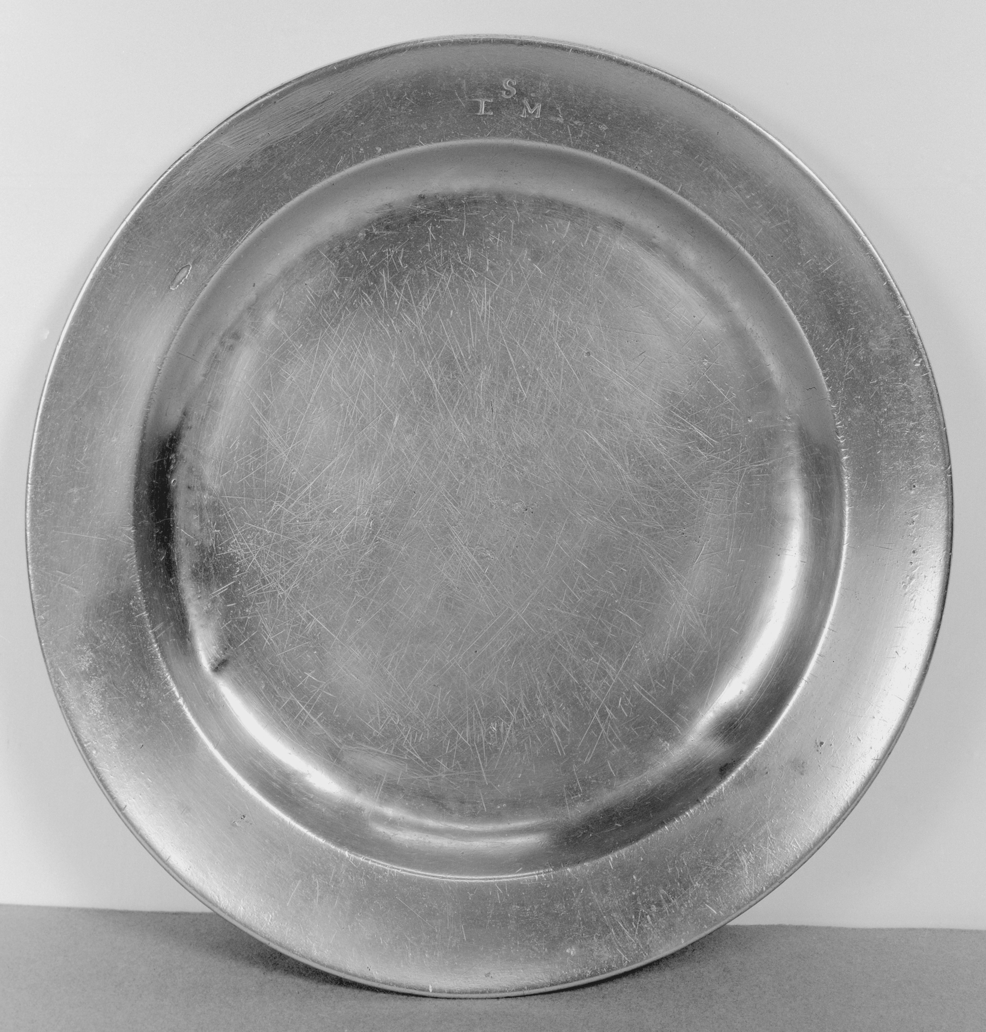 1957.0131 Pewter plate