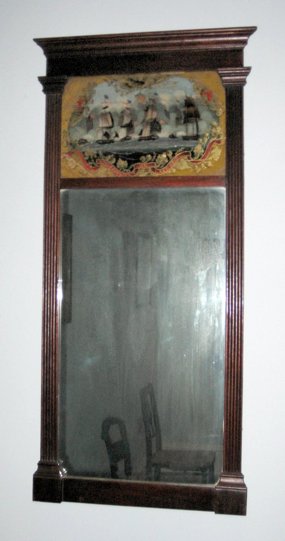 1957.0616 Reverse painted mirror