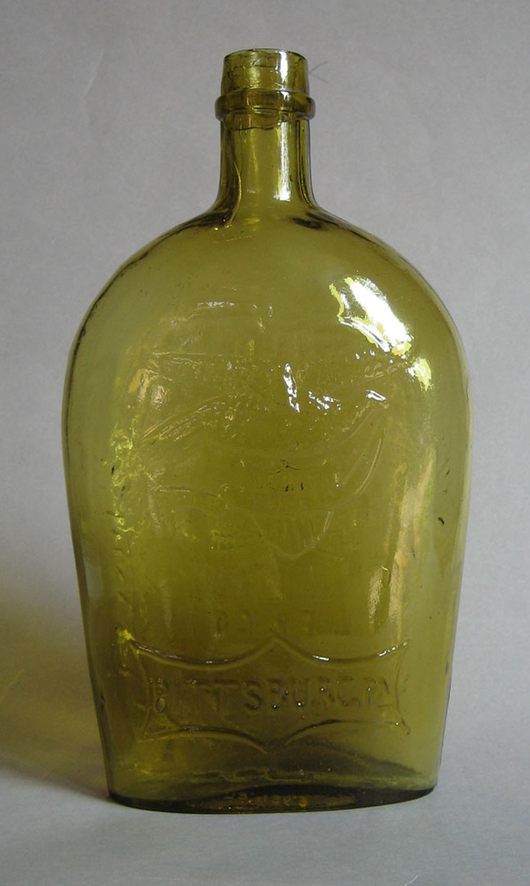1973.0436.003 (side 1) Glass Flask