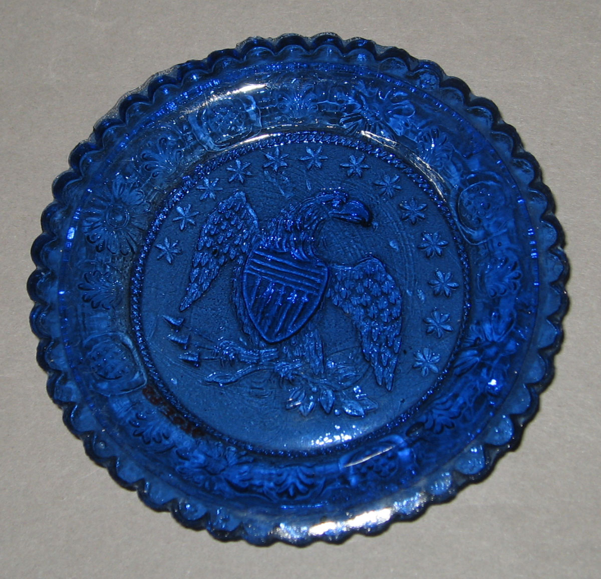 1959.3076 Blue glass cup plate