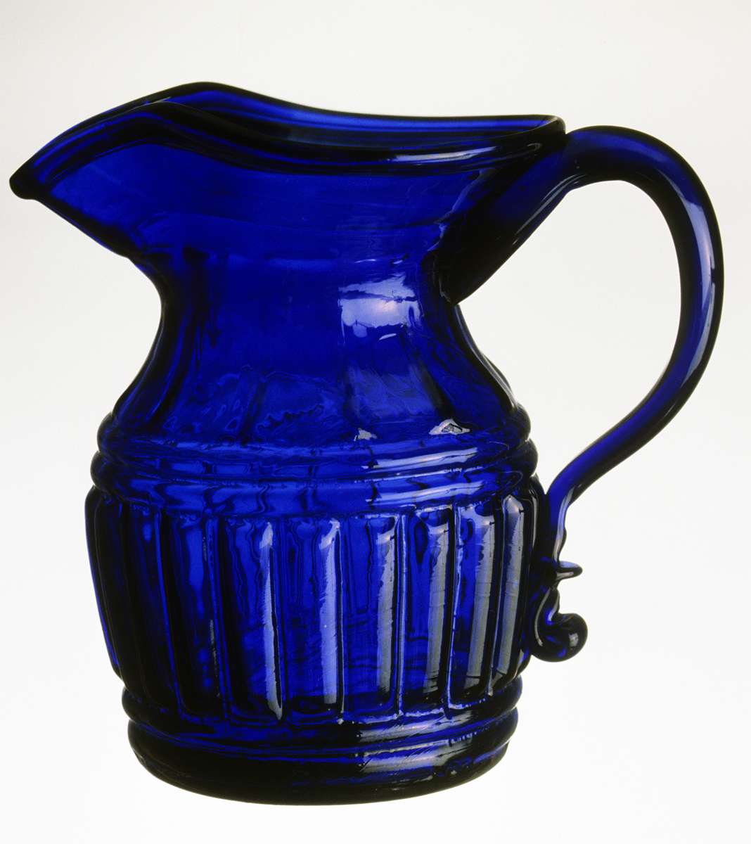 1973.0463 Blue glass cream jug