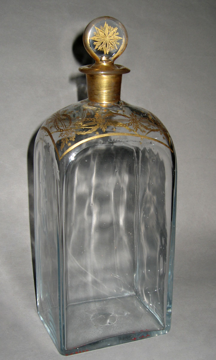 1957.0842 T Glass case bottle