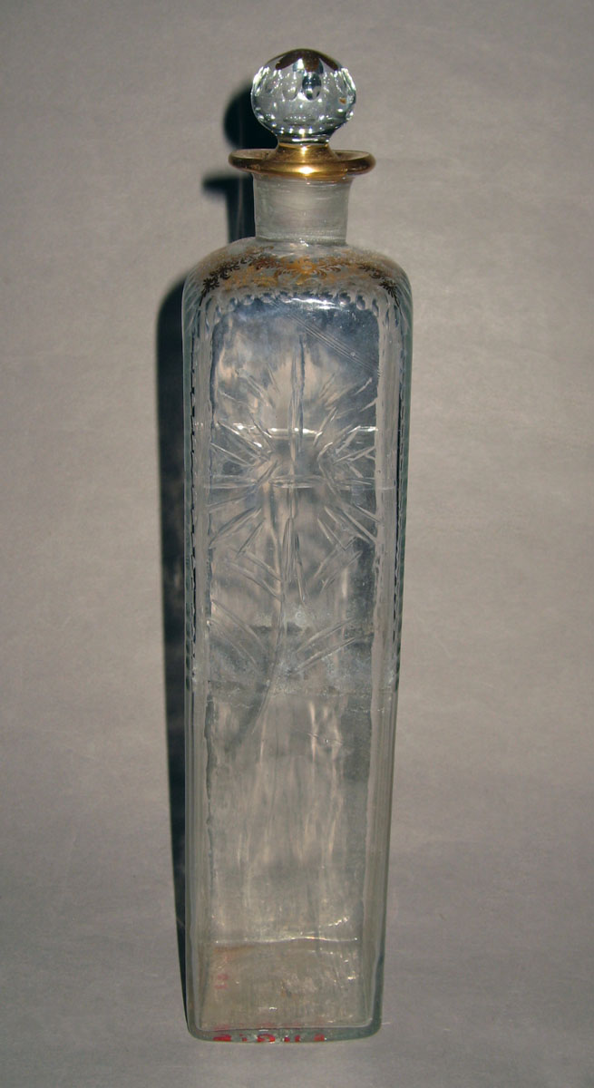 1957.0841 G, GG Glass case bottle