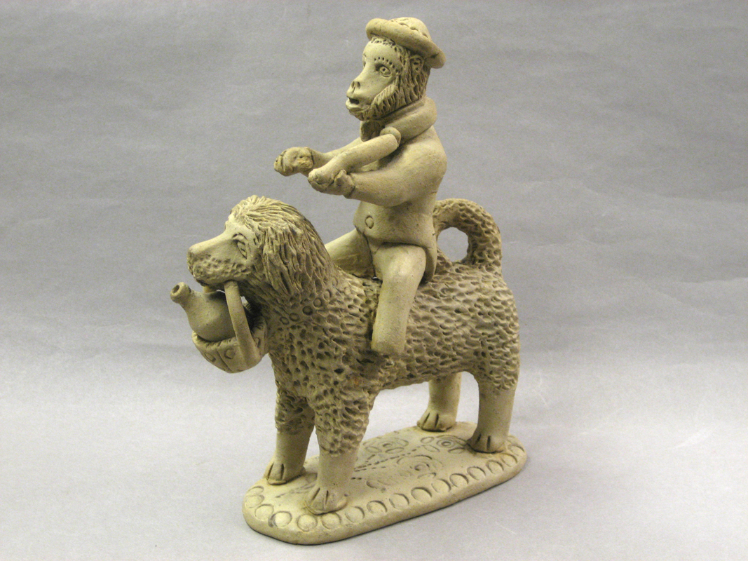 1968.0538 Figure (monkey on dog)