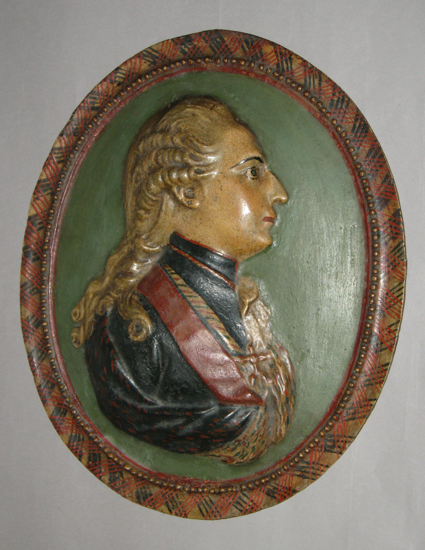 1965.1334.001 Chalkware male portrait plaque