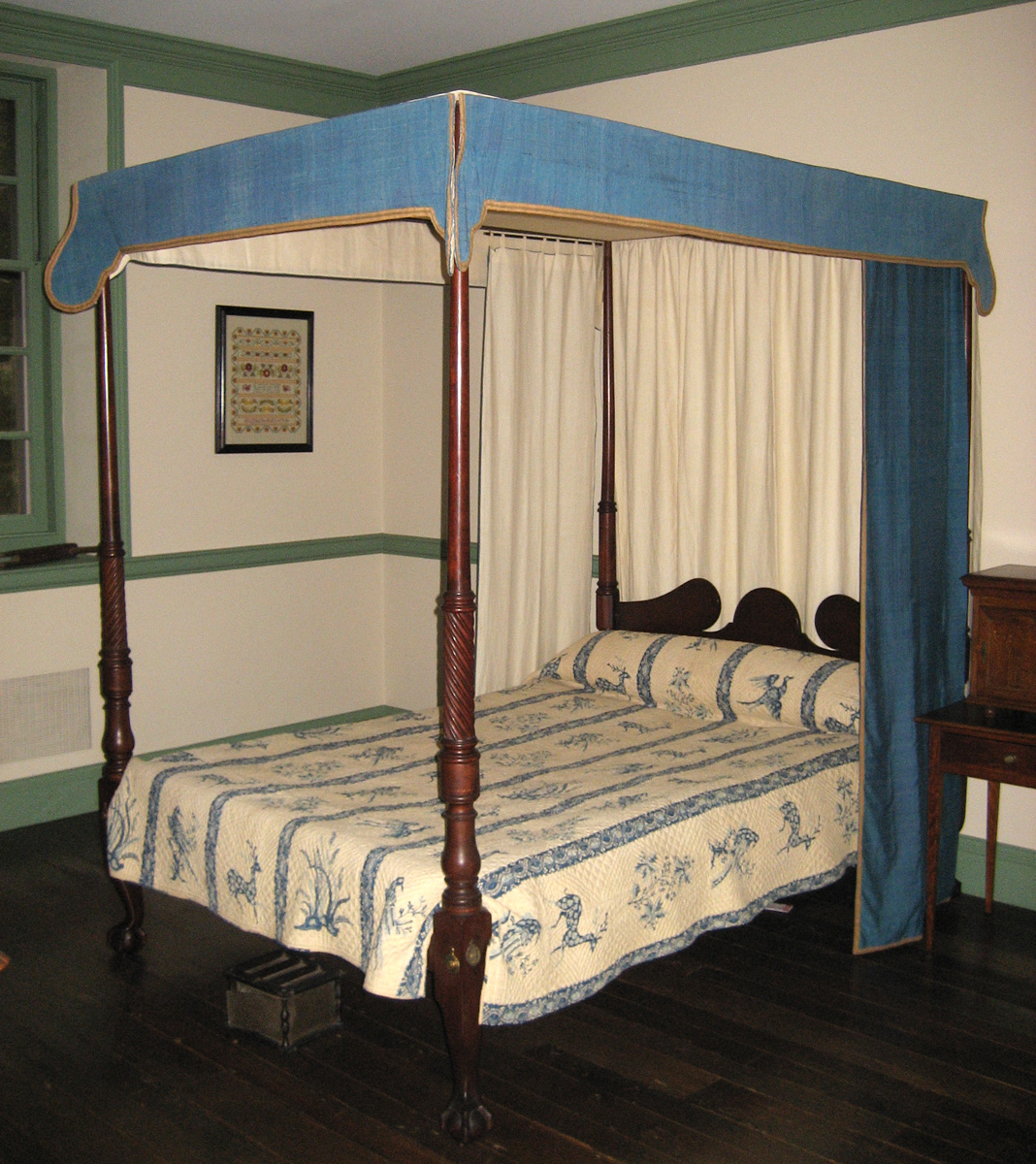1957.0040.002 bedstead with bed hangings 1964.0512 and quilt 1955.0656 J, K view 1