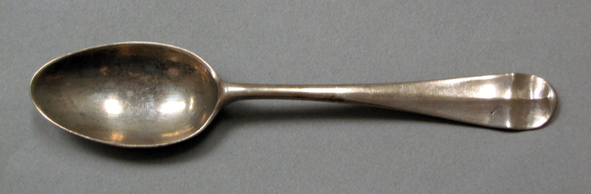 1962.0240.385 Silver spoon upper surface
