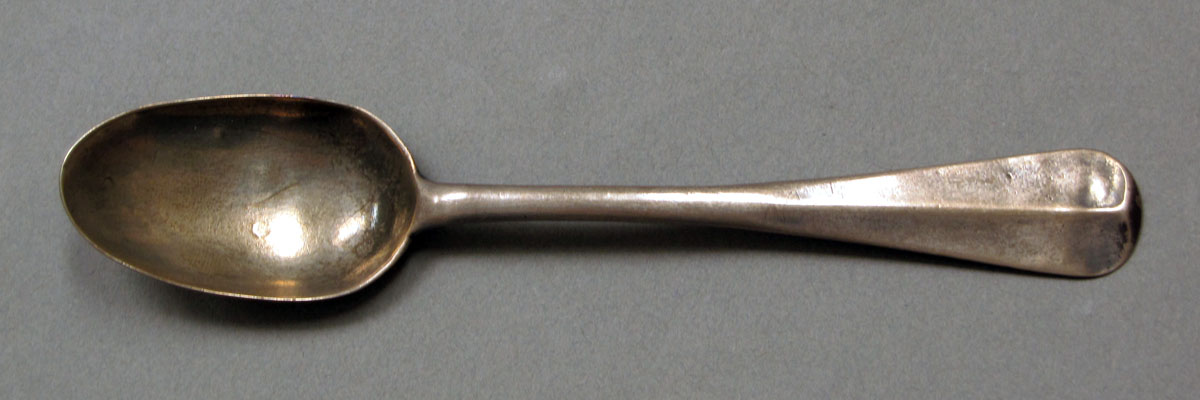 1962.0240.408 Silver spoon upper surface