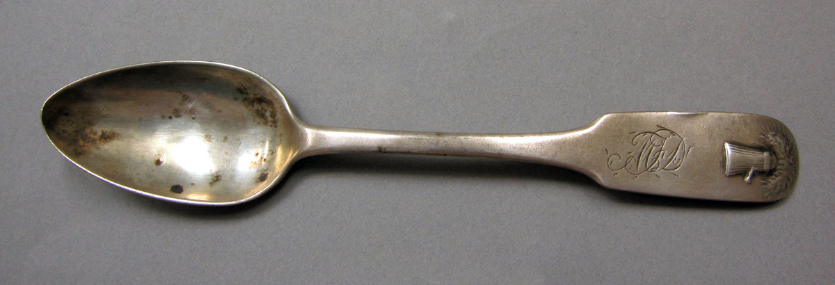 1962.0240.419 Silver spoon upper surface