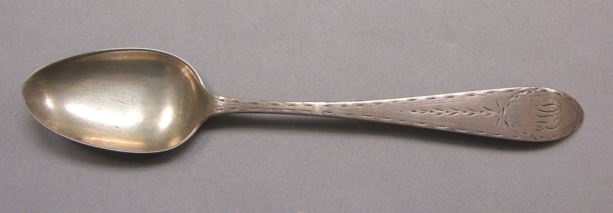 1962.0240.351 Silver spoon upper surface