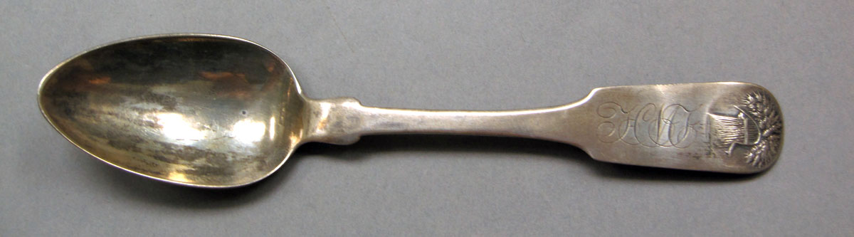 1962.0240.246 Silver spoon upper surface