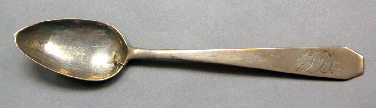 1962.0240.526 Silver spoon upper surface