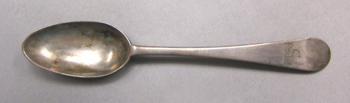 1962.0240.532 Silver spoon upper surface