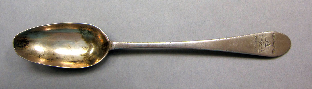 1962.0240.534 Silver spoon upper surface