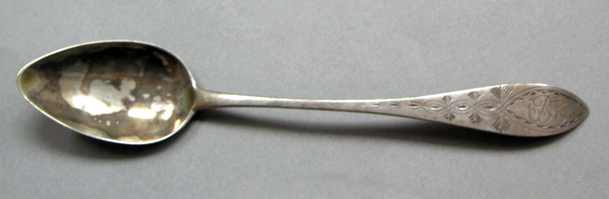 1962.0240.618 Silver spoon upper surface