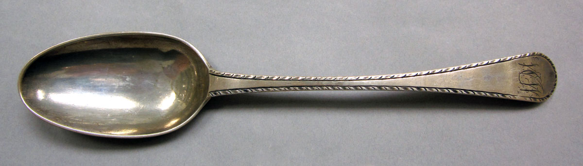 1957.0059.002 Silver spoon upper surface