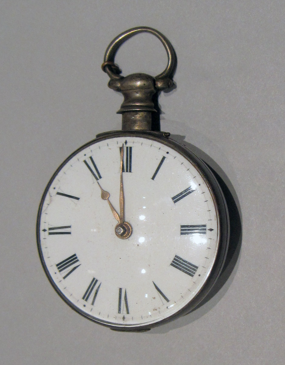 1957.0579 A, B Silver Watch upper surface