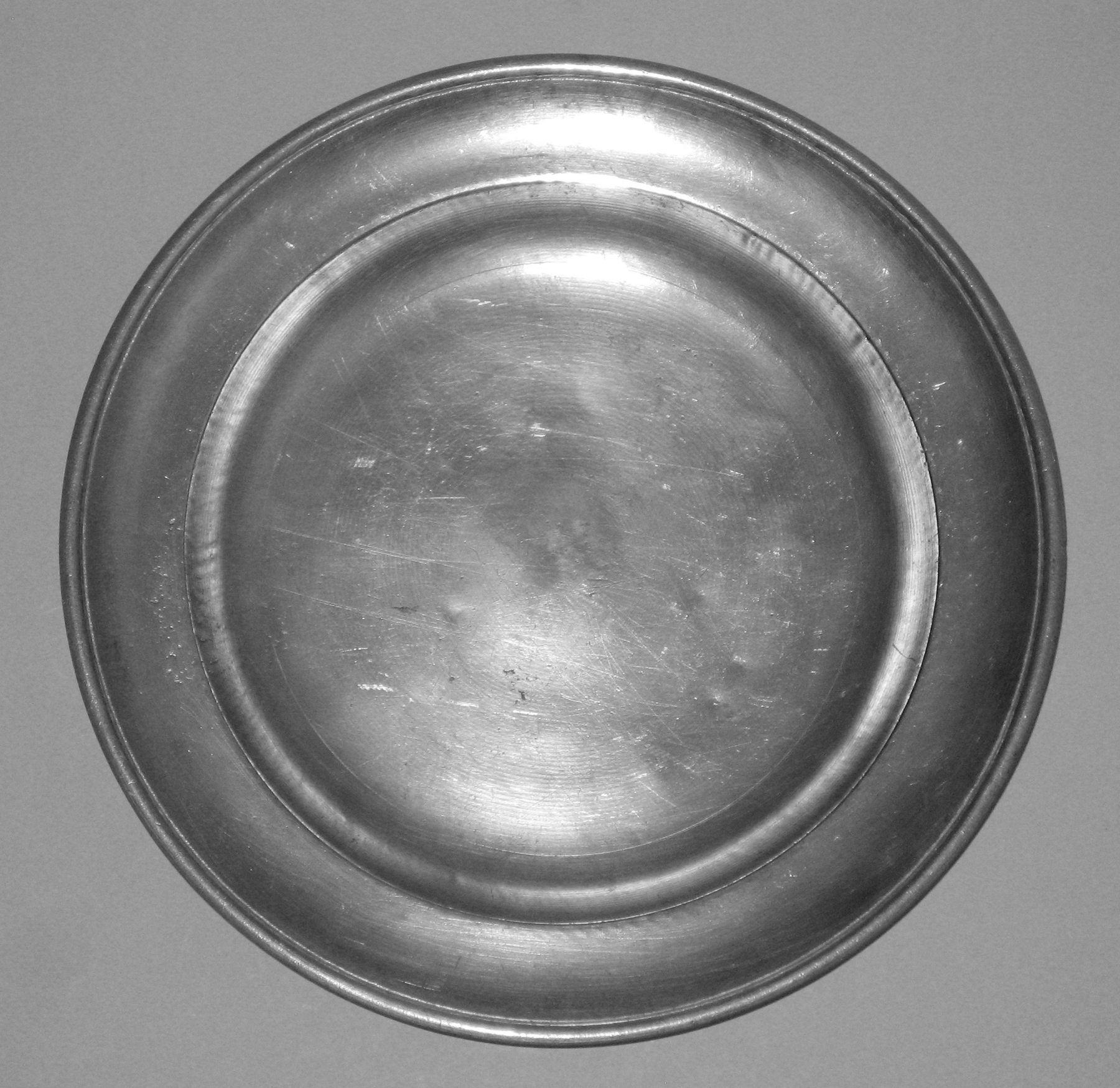 1965.1458 Pewter plate