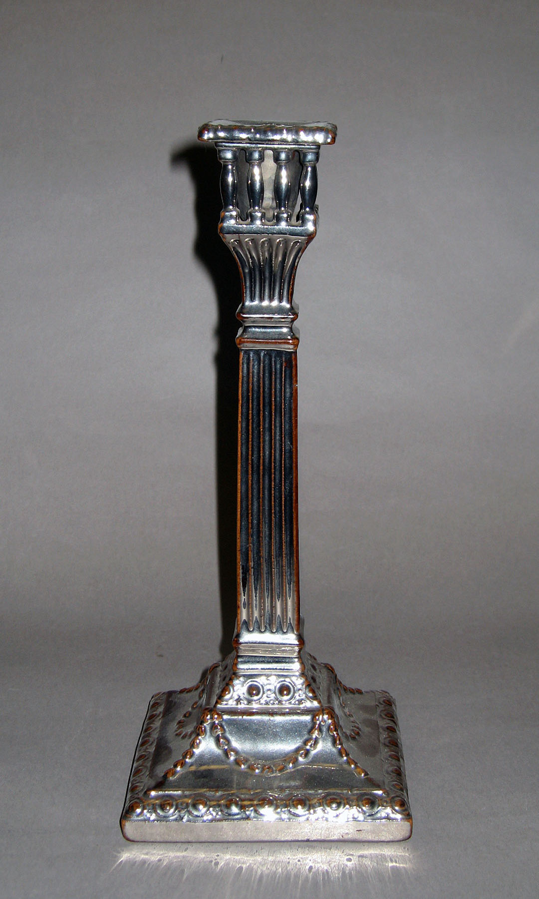 1958.1243 Lusterware candlestick