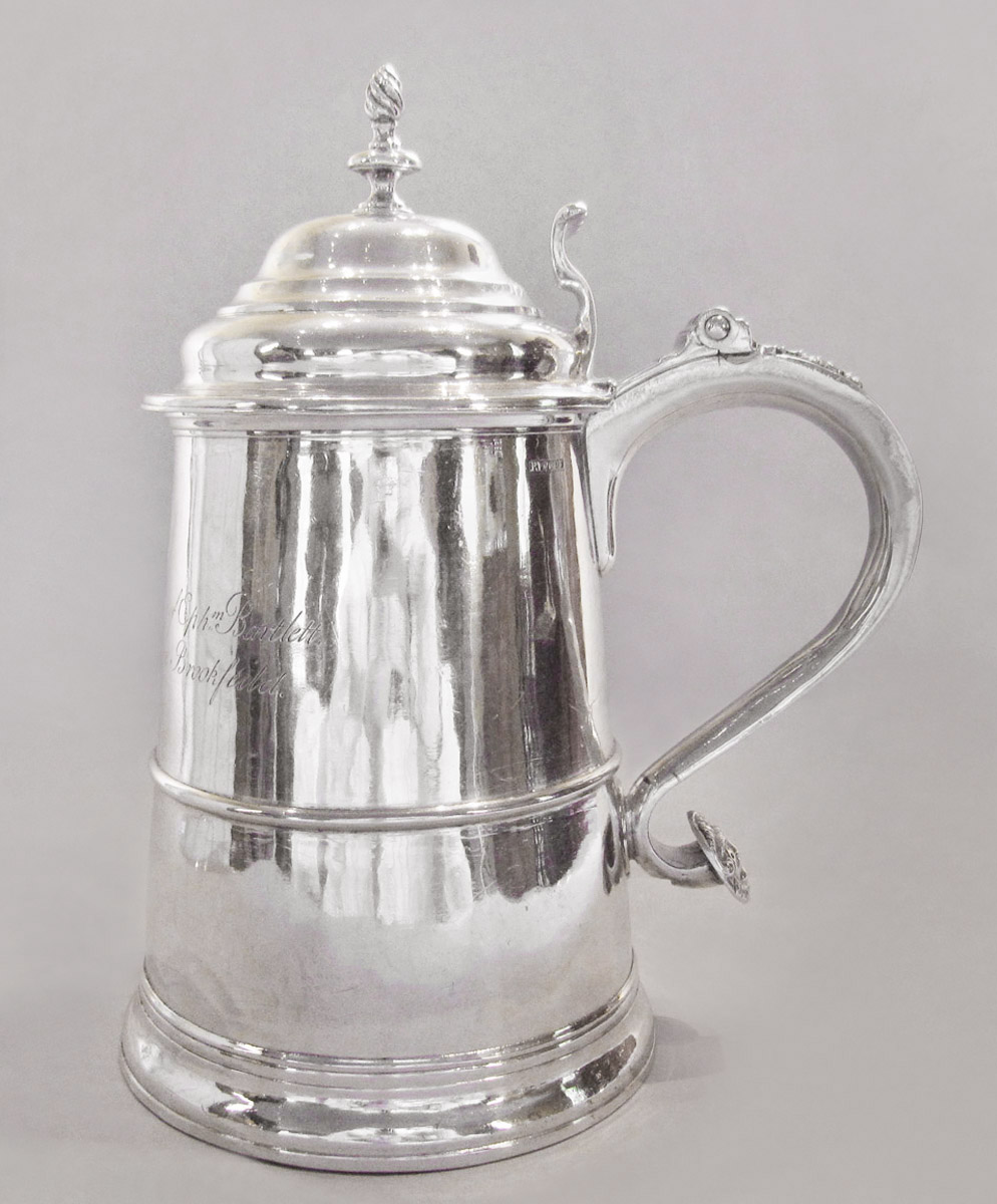 1957.0859.003 Tankard, side 1