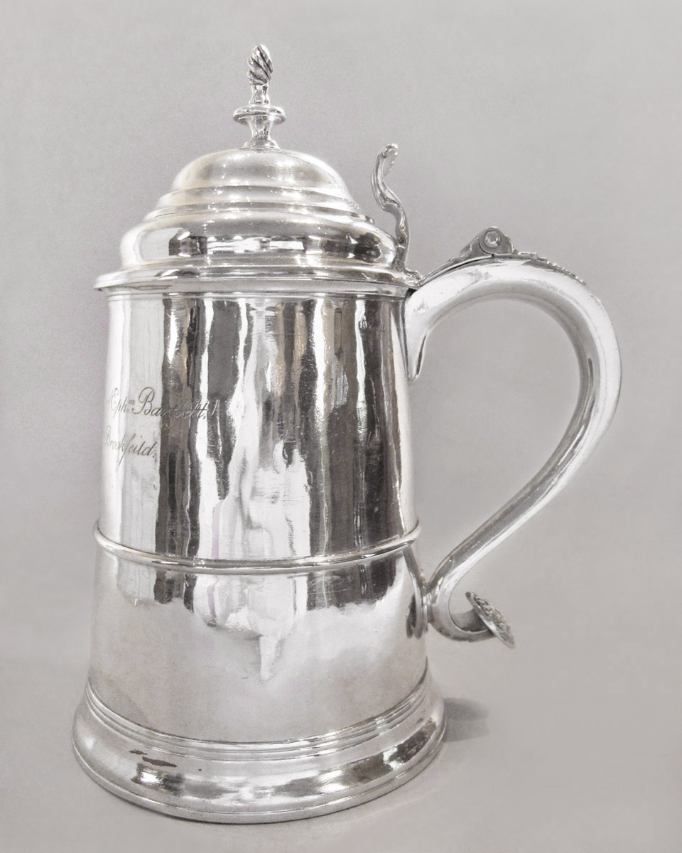 1957.0859.002 Tankard, side 1