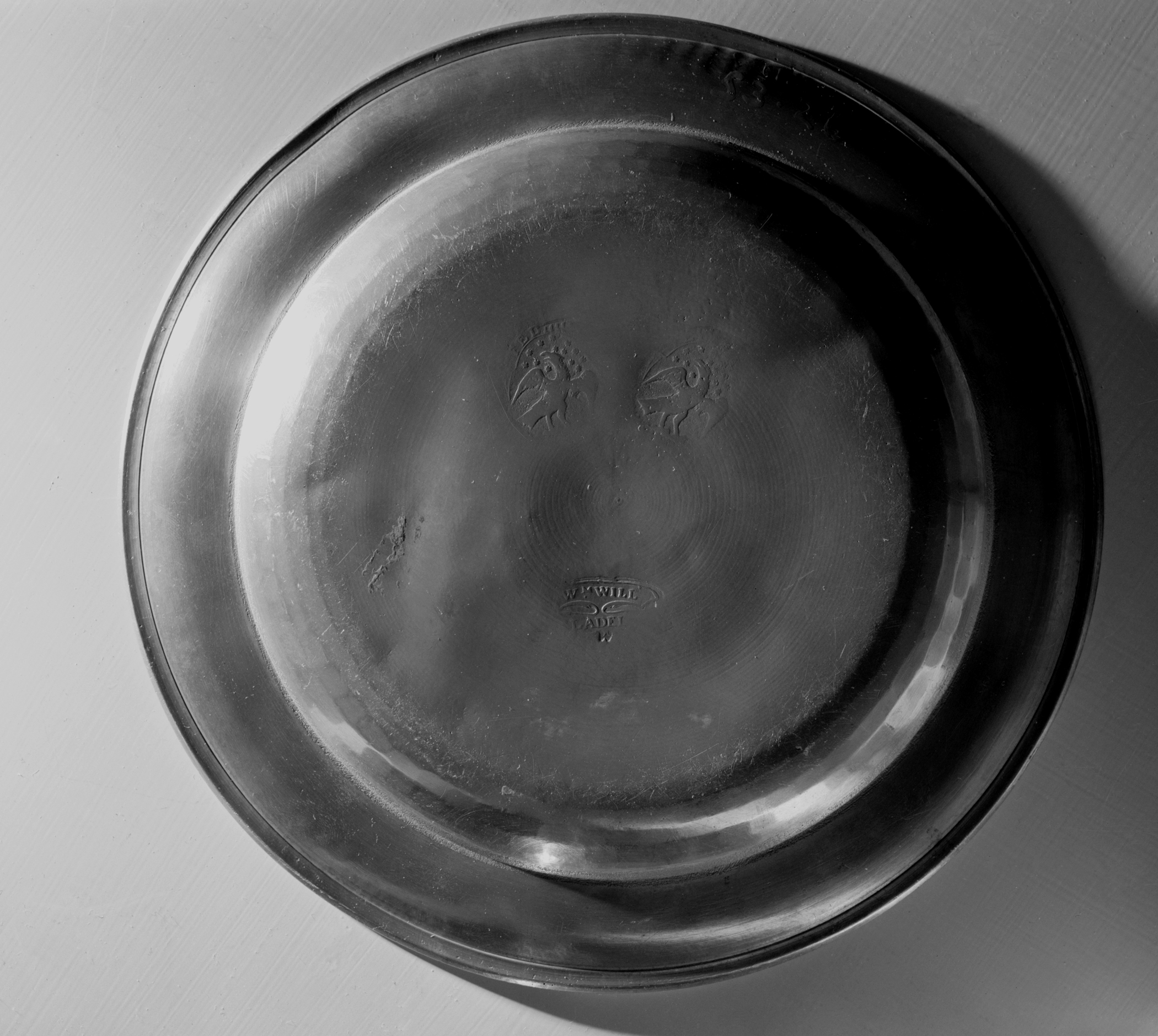 1953.0026 Pewter plate (marks-overall)