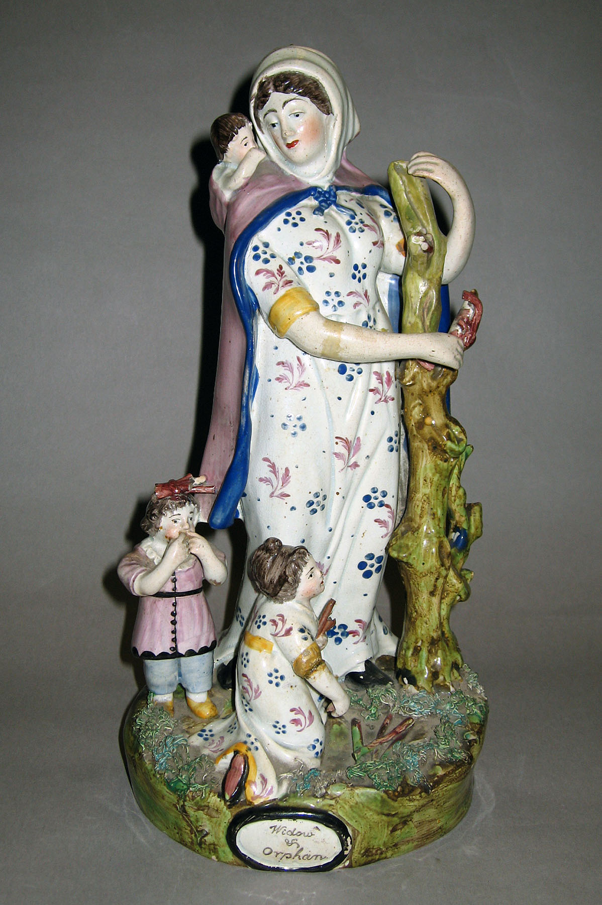 1958.3102 Creamware figure group