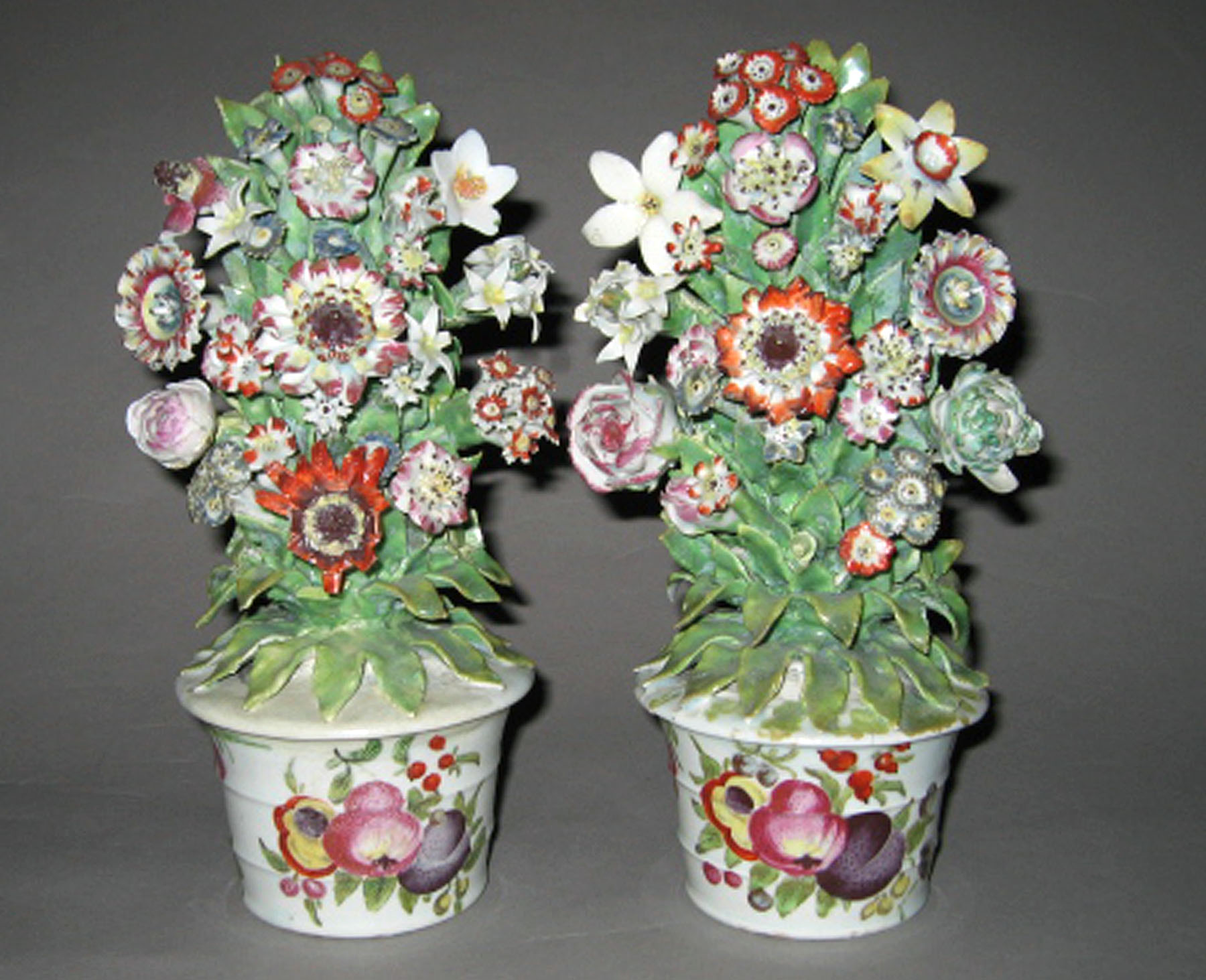 2003.0013.085.001, .002 Porcelain pots with modeled flowers