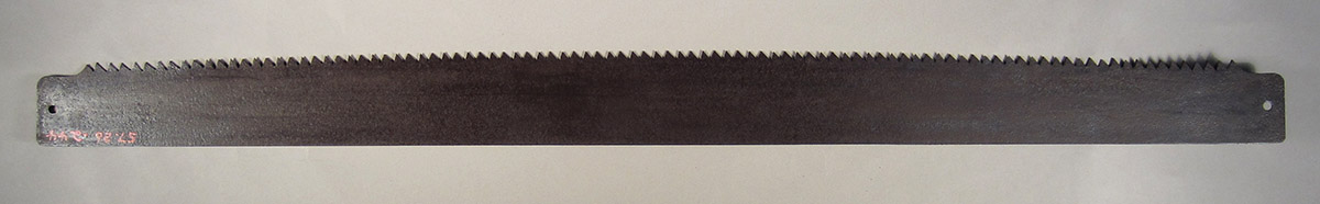 1957.0026.244 Saw blade, side 1
