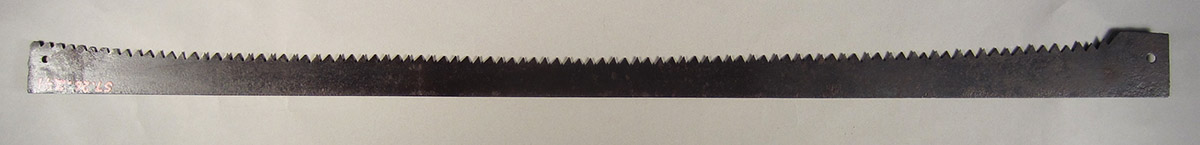 1957.0026.241 Saw blade, side 1