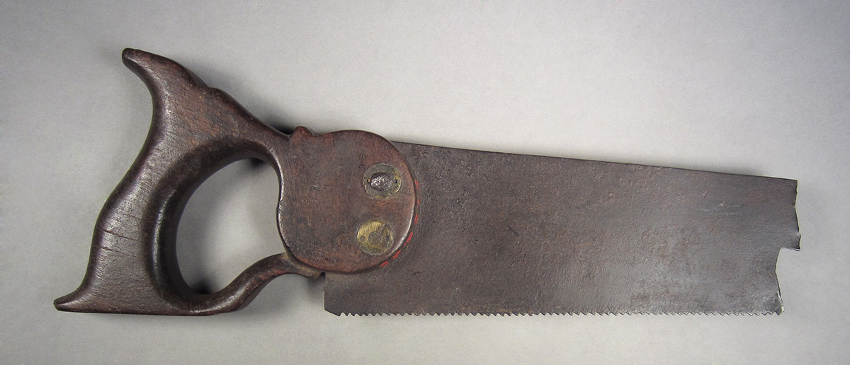 1957.0026.025, Hand saw, side 1