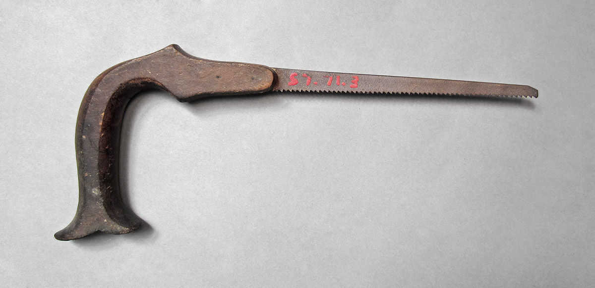 1957.0071.003, Keyhole saw, side 1