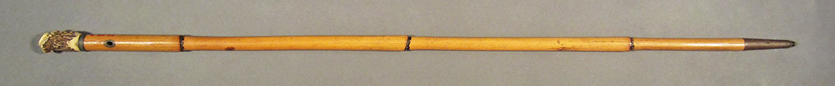 1957.0034.004, Cane, side 1