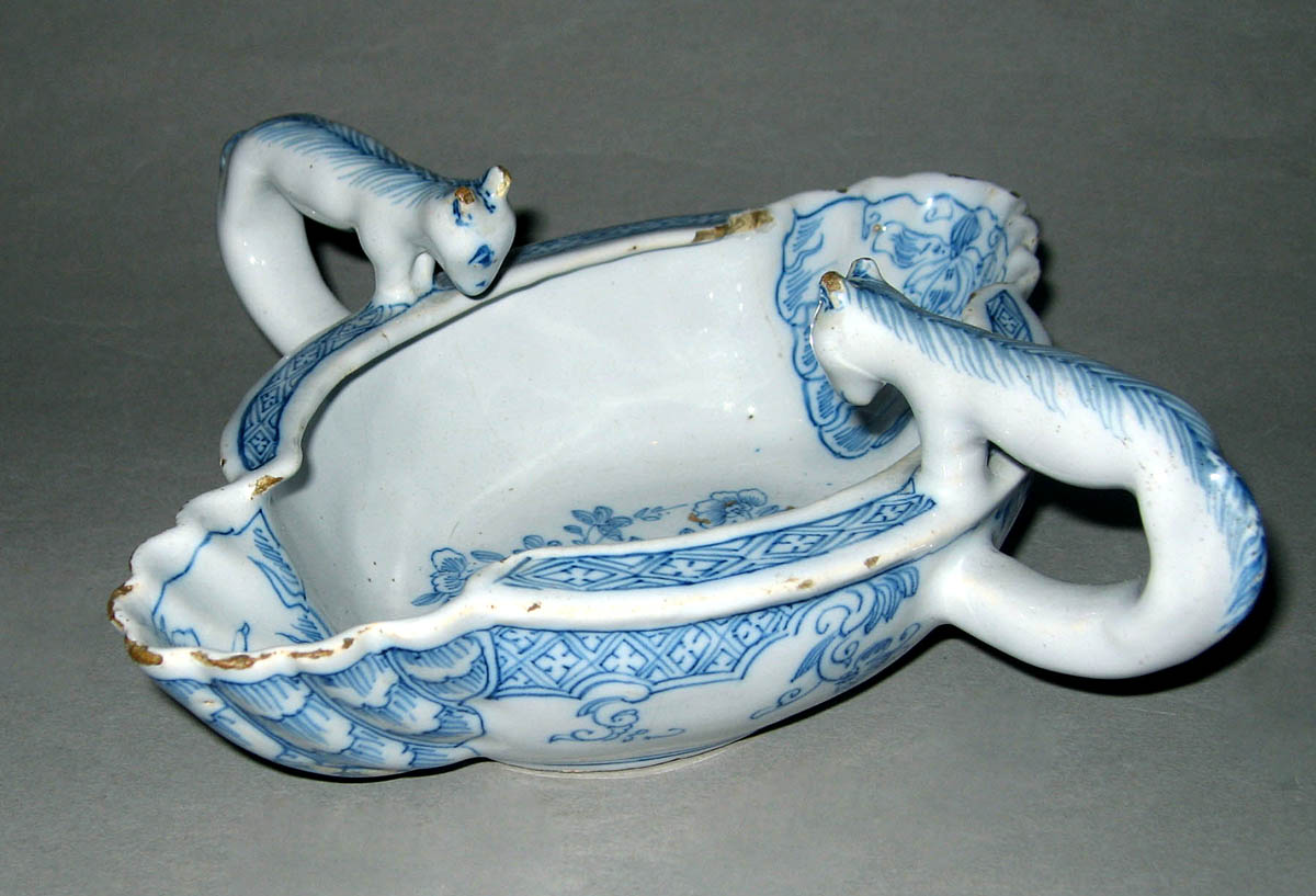 1962.0596 Earthenware sauceboat