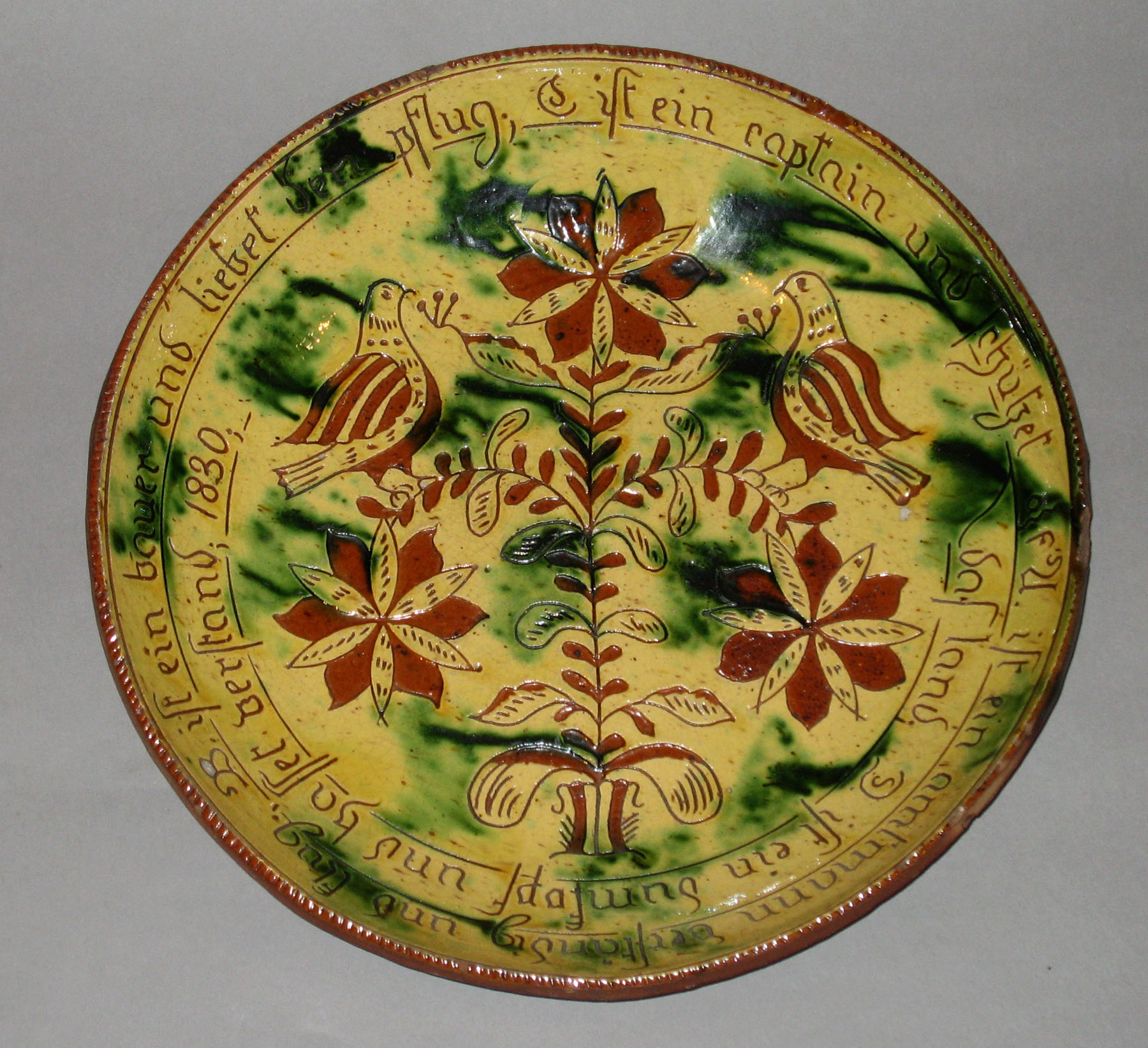 1960.0659 PA sgraffito slipware dish