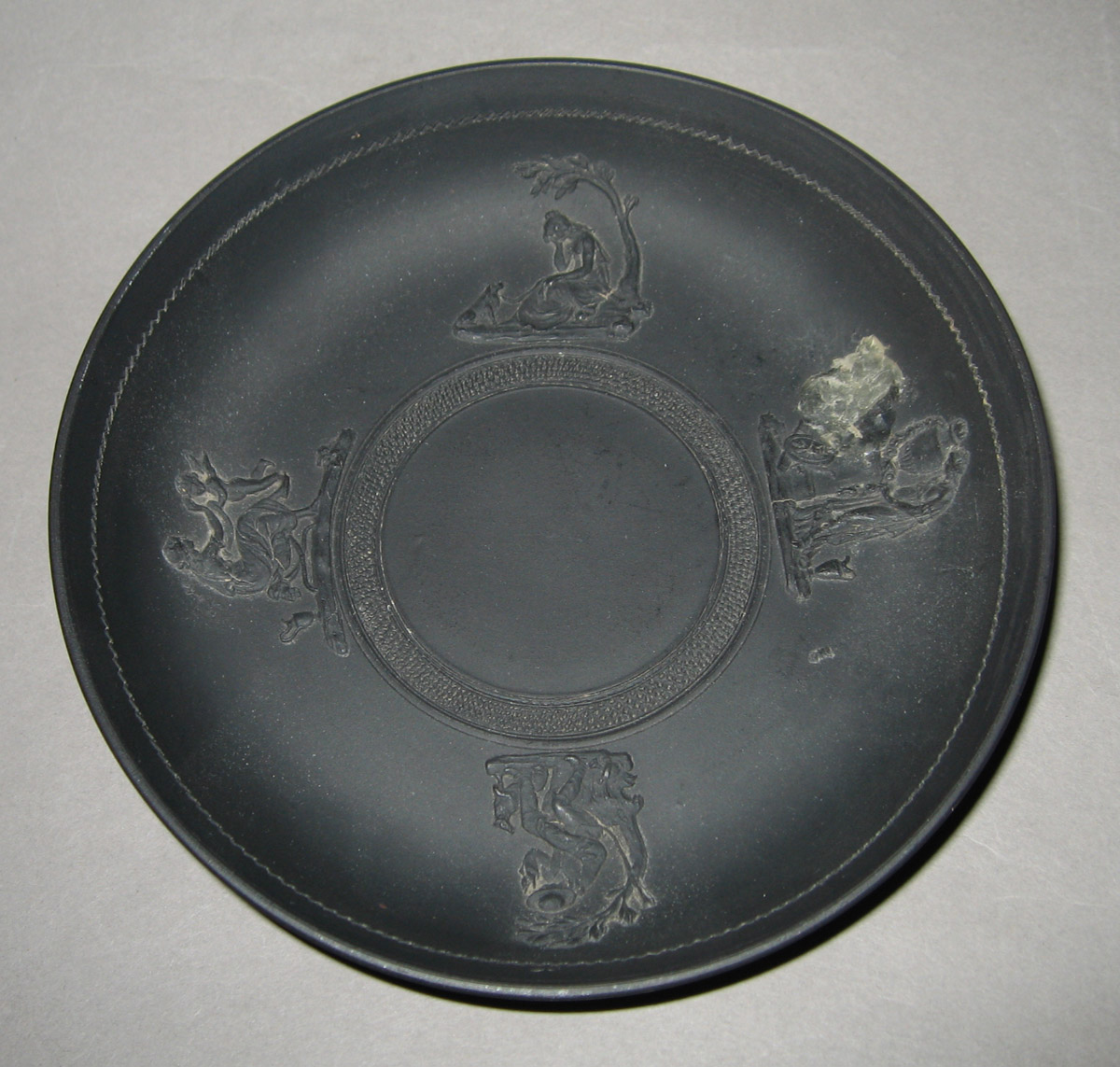 1957.0126.016 Black basalt saucer