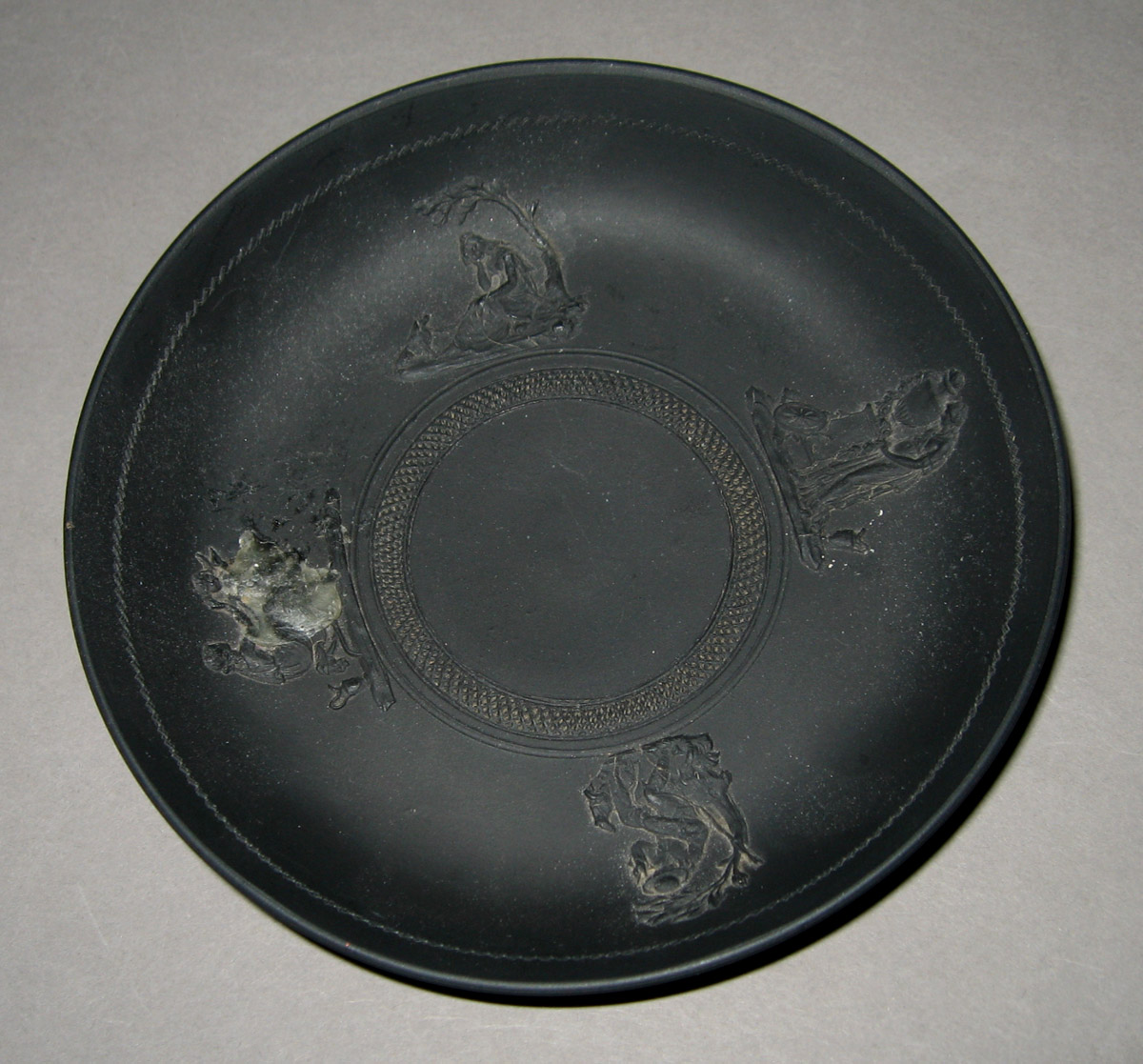 1957.0126.014 Black basalt saucer