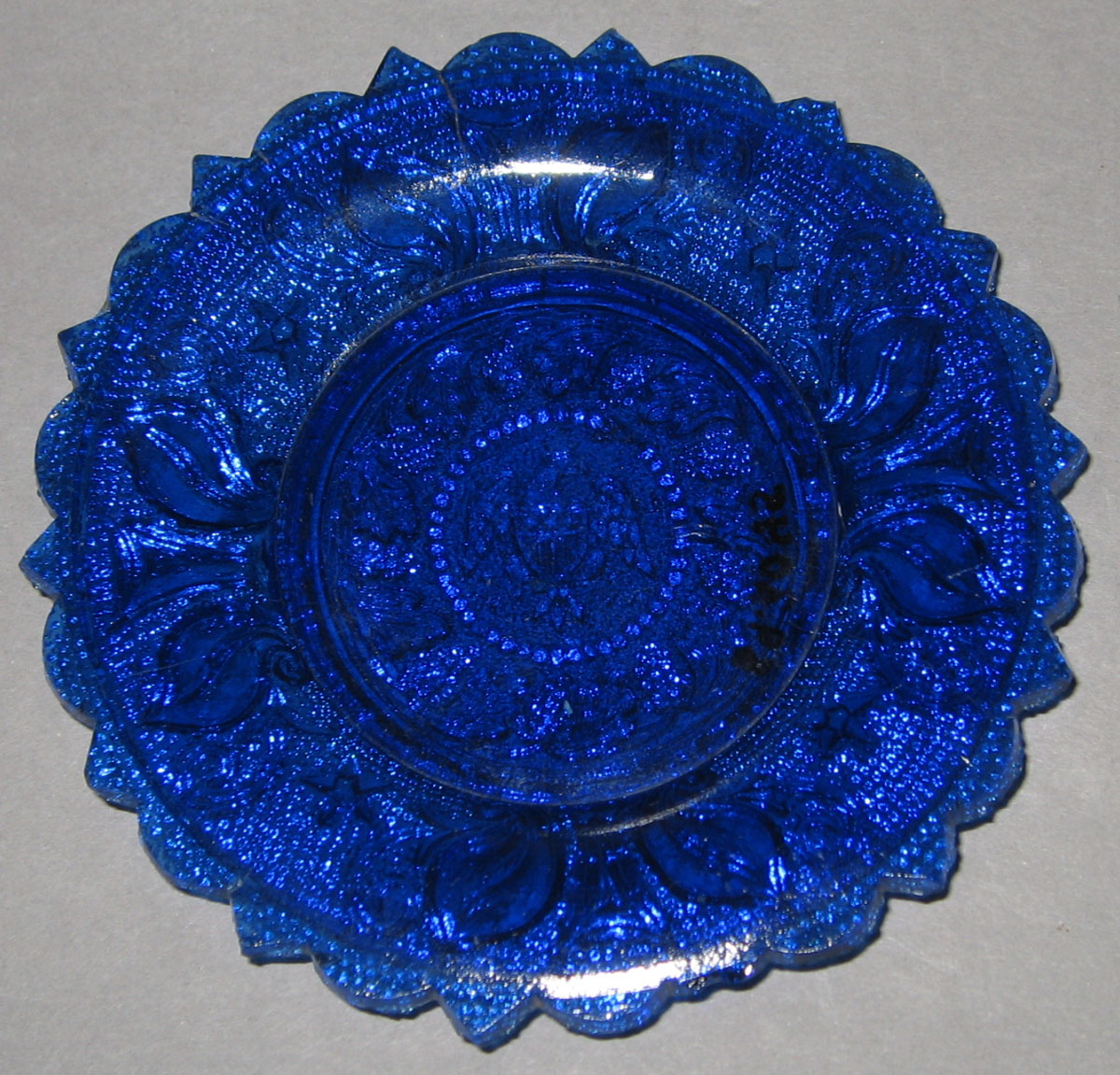 1959.3045 Lead glass cup plate