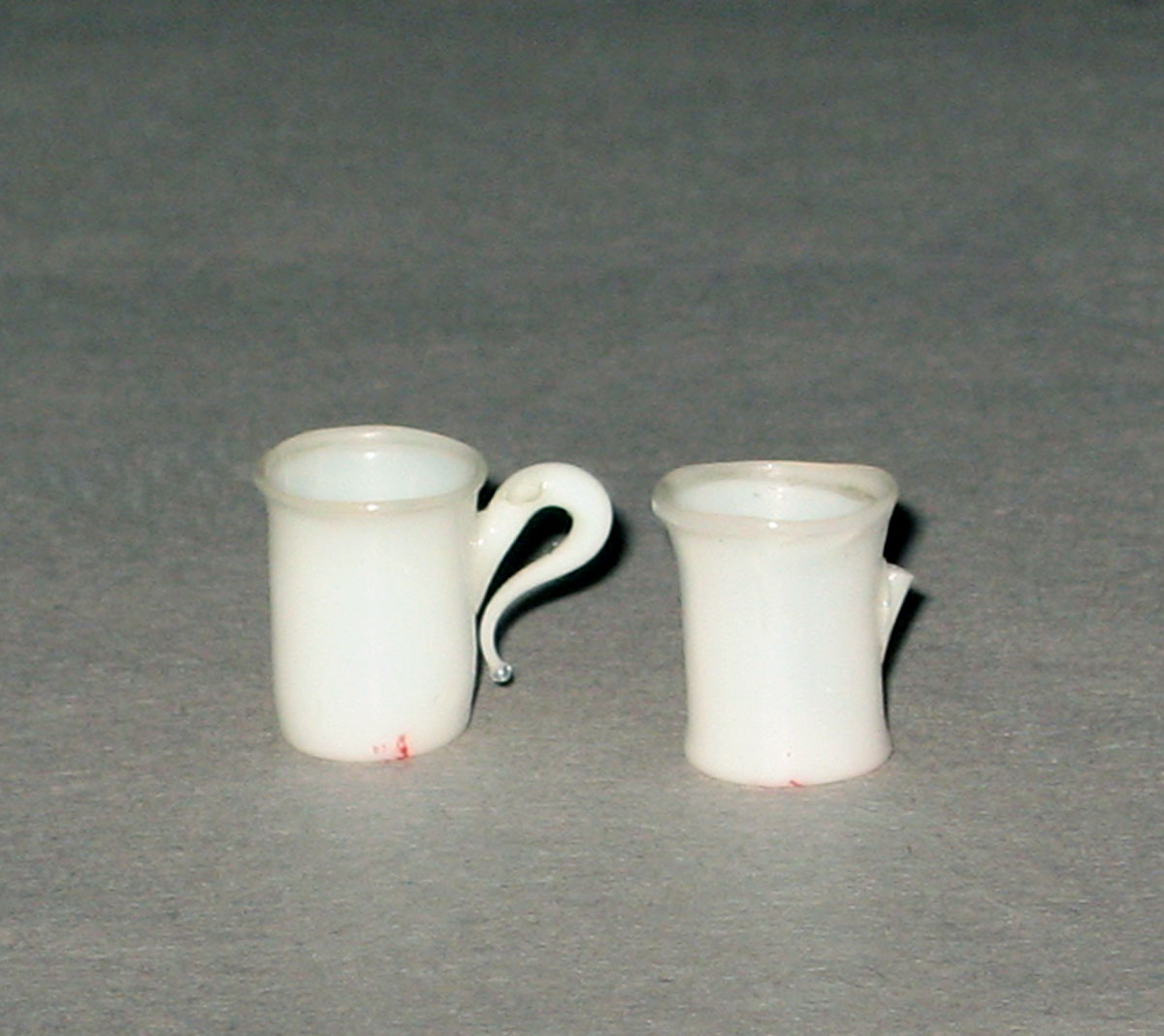 1964.1396.002, .004 Miniature glass teacups