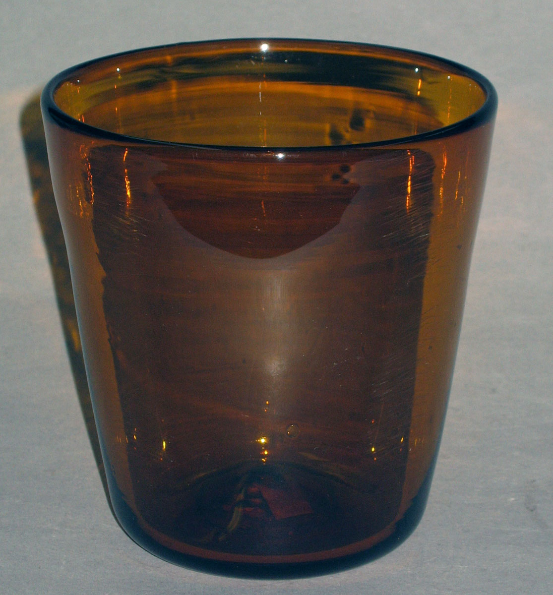 1965.2320.008 Amber glass tumbler