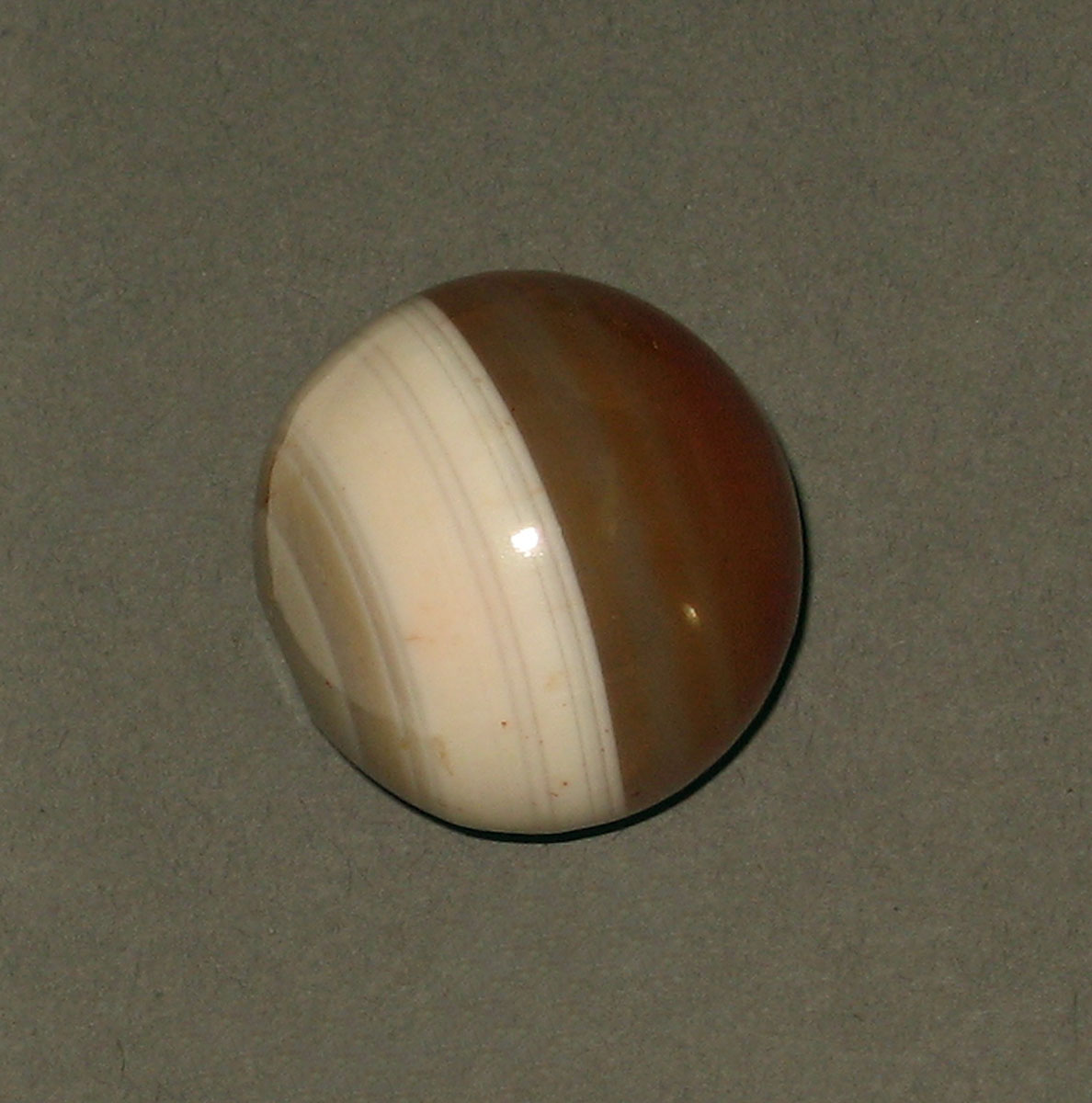 1965.1297 Glass marble