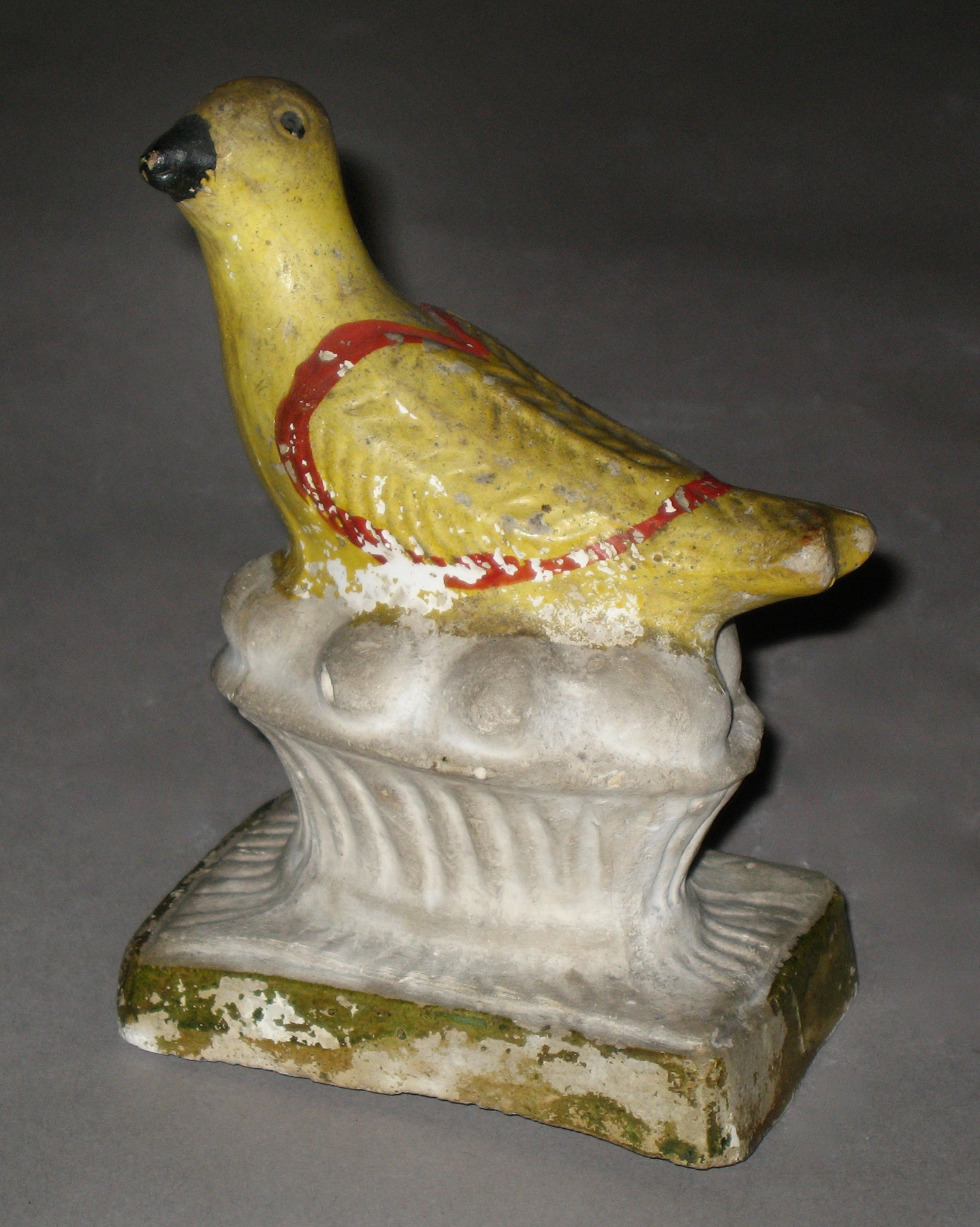 1964.1658 Chalkware bird in nest with eggs