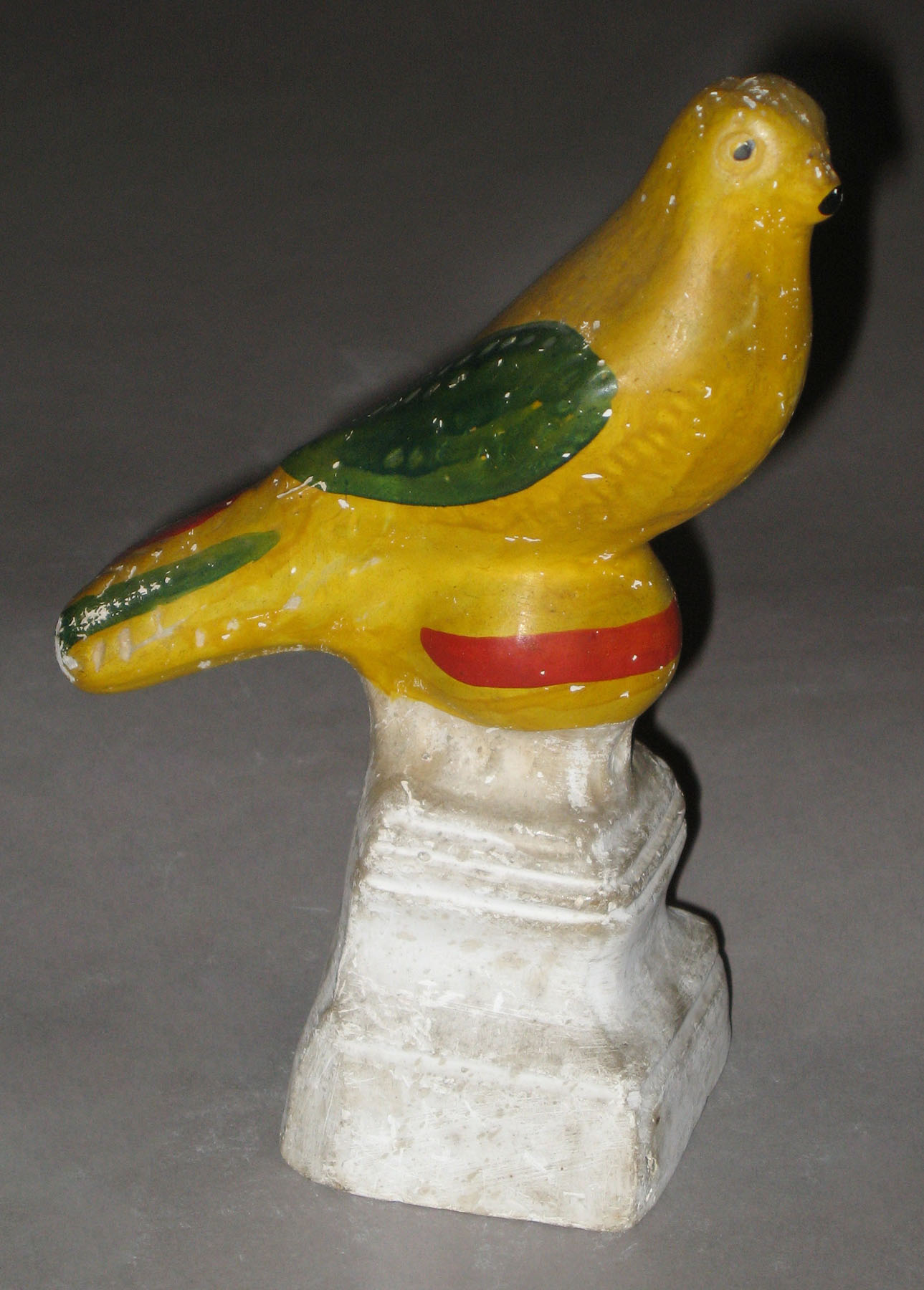 1964.1703 Chalkware bird on ball