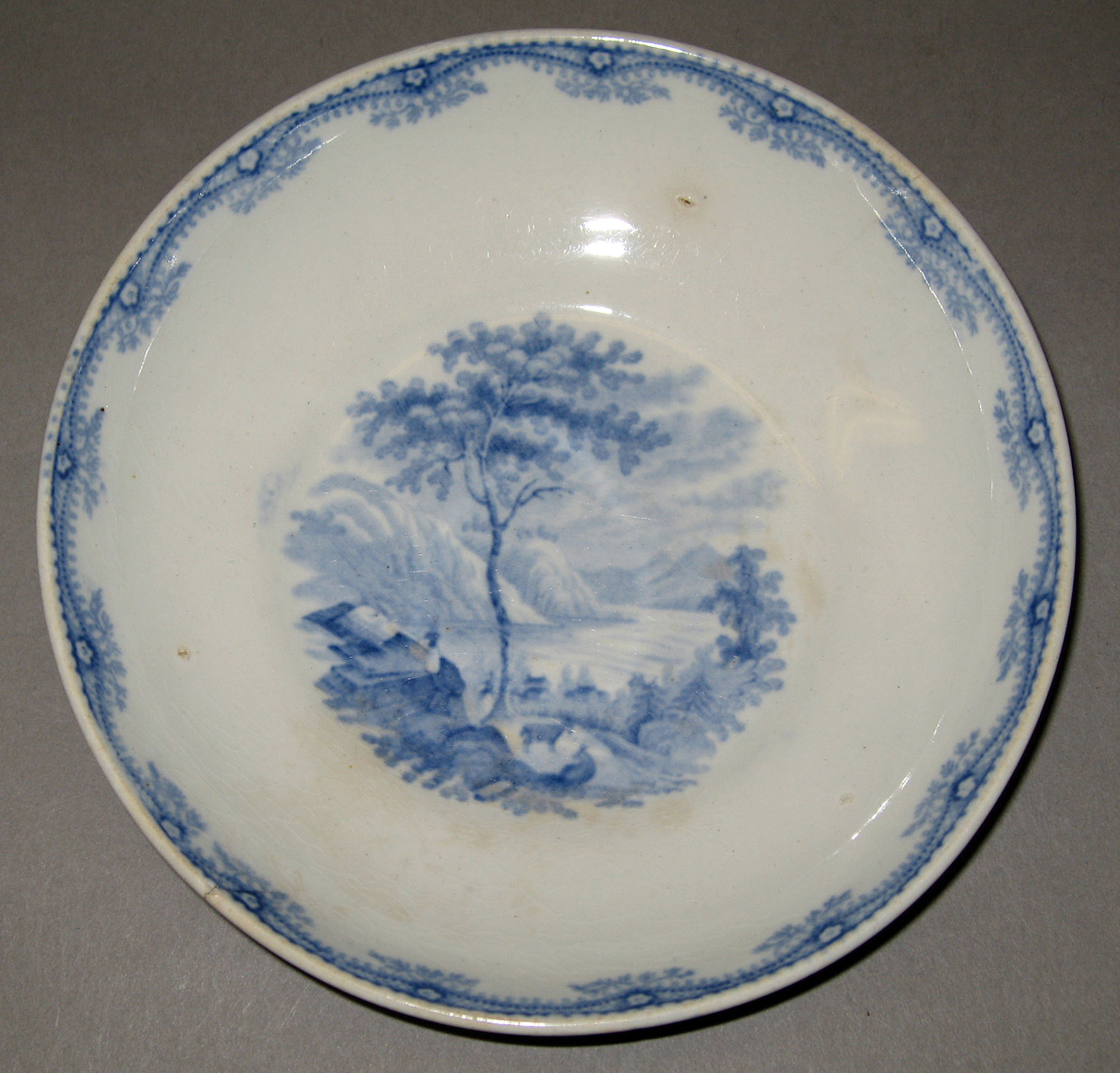 1965.2915.011 Ridgway earthenware saucer