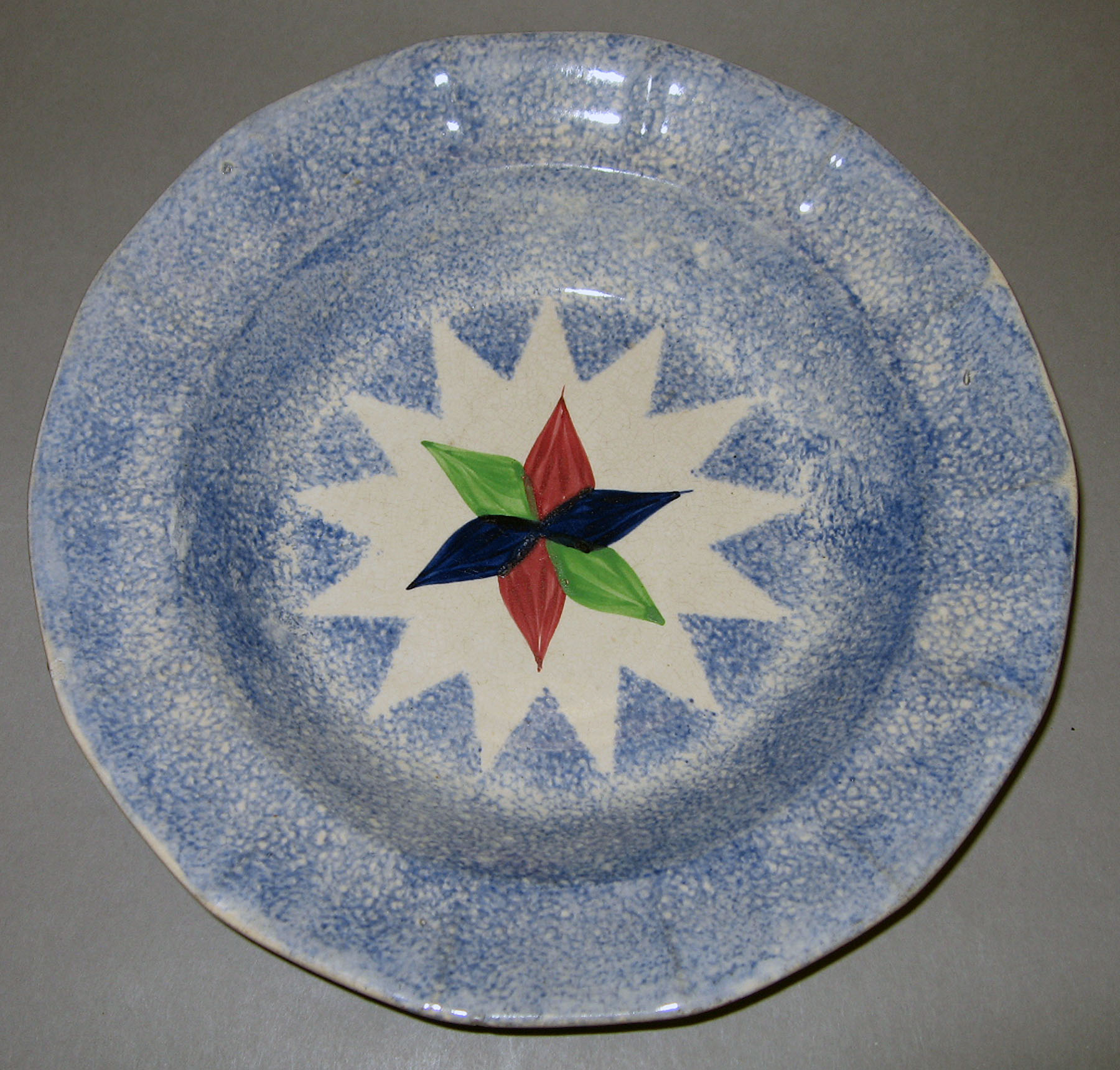 1965.0900.001 Spatterware soup plate