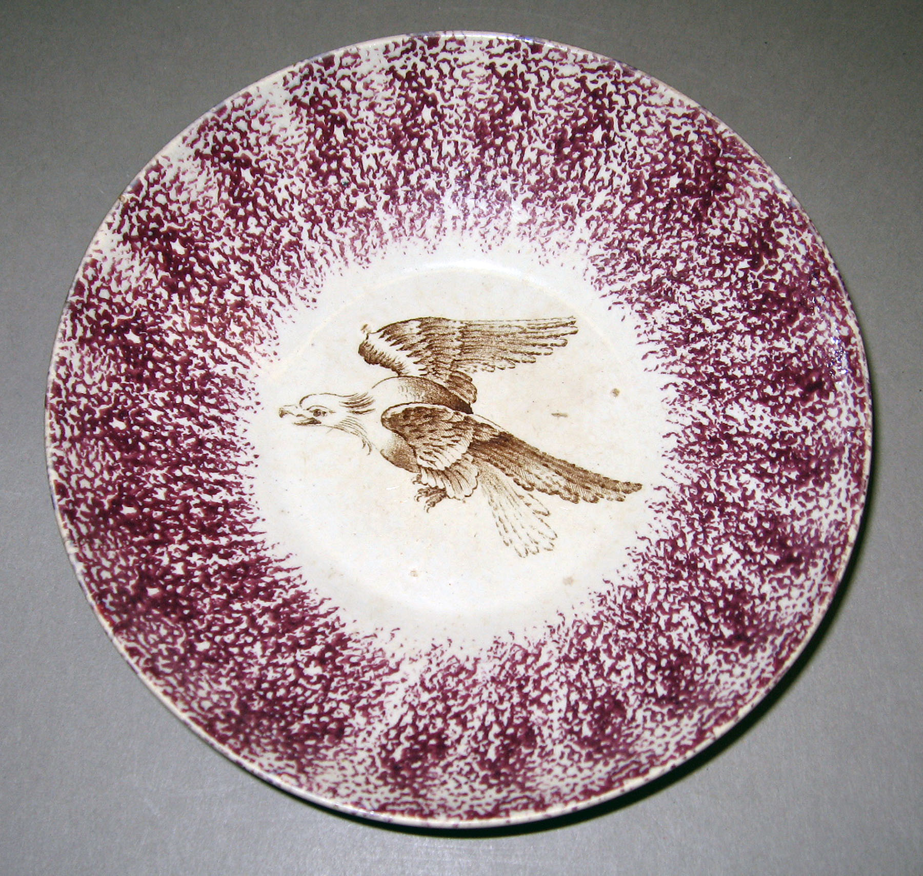 1965.0910.004 Spatterware saucer