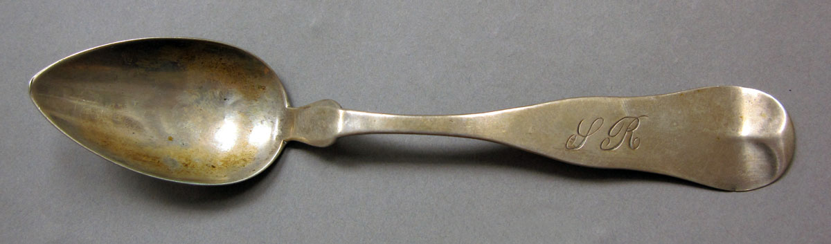 1962.0240.415 Silver spoon upper surface